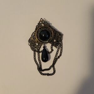 EVC Art Deco Mourning Brooch with Onyx Center Stone
